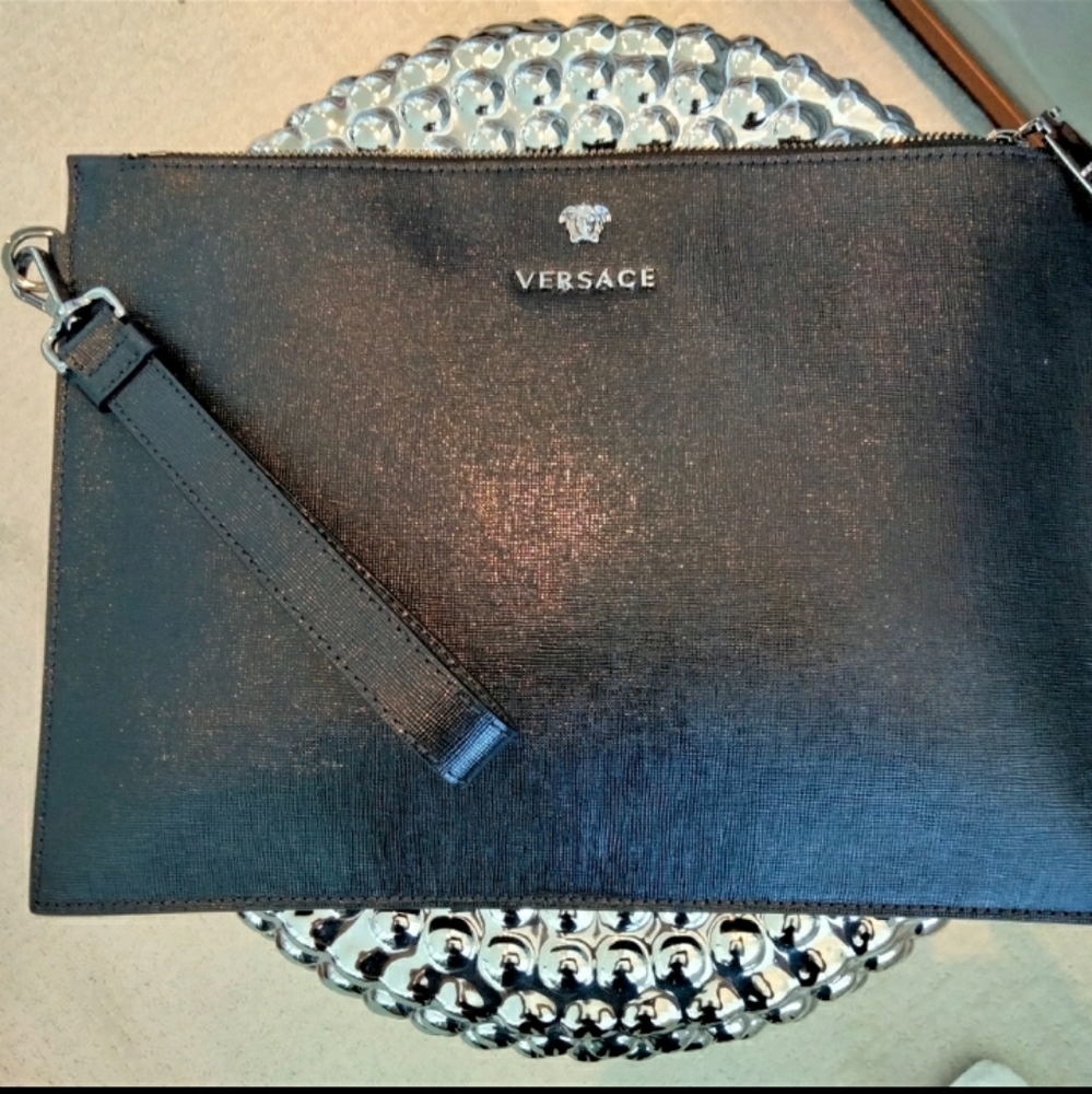 COPY - Versace authentic leather clutch with wristlet strap and silver hardware.